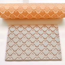 Load image into Gallery viewer, Criss Cross Bow Texture Roller
