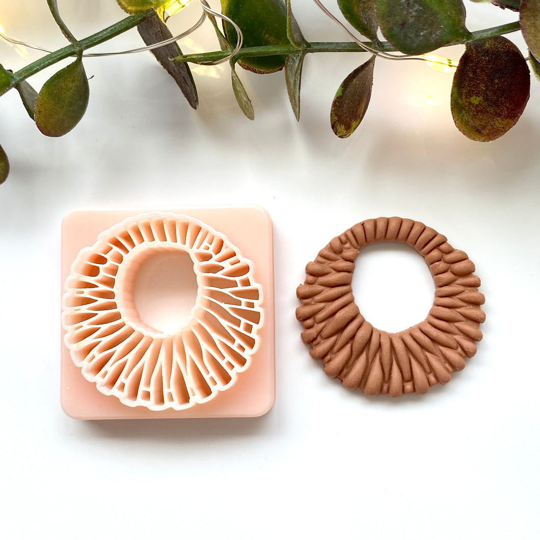 Asymm Circle Donut Rattan